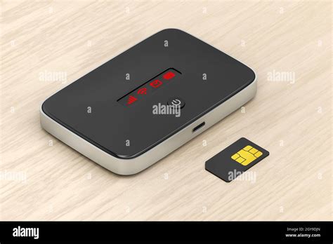 5g Wi Fi Mobile Router And Sim Card On Wooden Desk Stock Photo Alamy