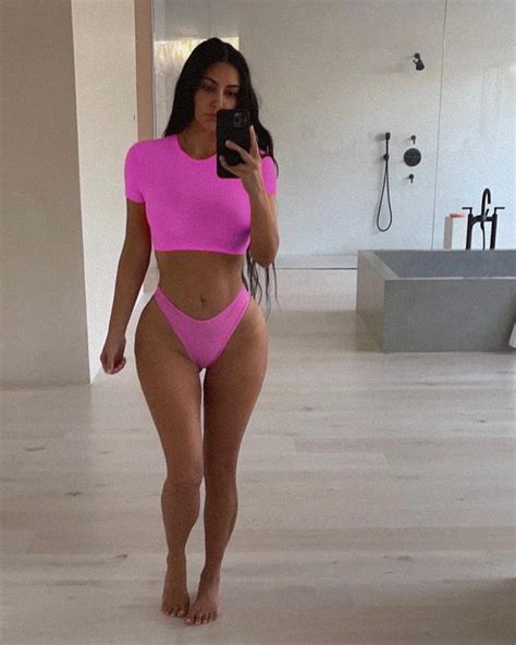 Kim Kardashian S Seductive Curves In Pink Bikini Photos The Fappening