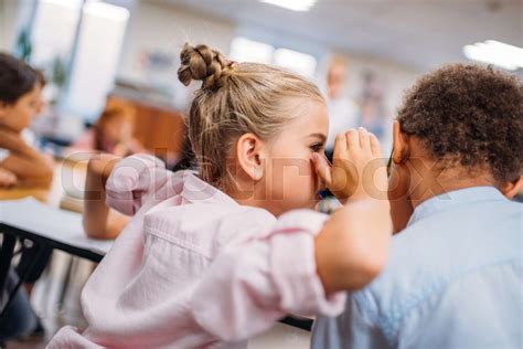 Kids Gossiping At School Stock Image Colourbox