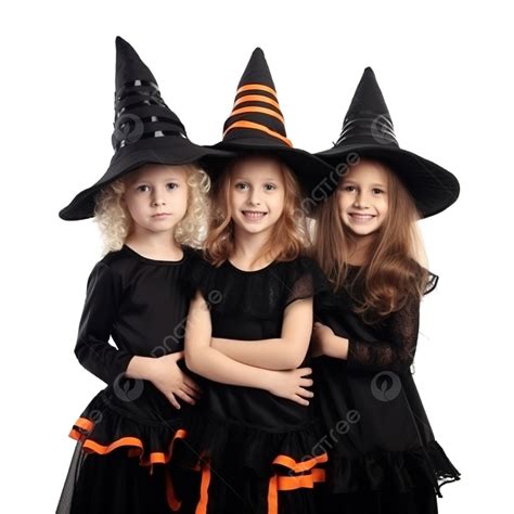 Three Girls Sisters In Witch Costumes Have Fun Celebrating Halloween