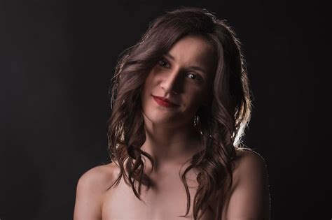 Premium Photo Smiling Brunette Woman With Naked Shoulders Studio Shot