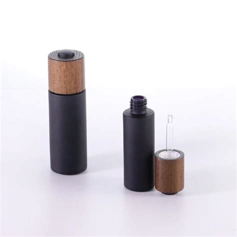 Matte Black Frost Glass Bottle With Wood Dropper China Manufacturers