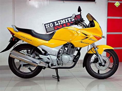 hero honda karizma  side view yellow