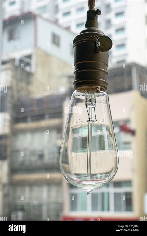 close   vintage light bulb aesthetic hanging  downtown