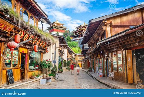 Dukezong Tibetan Old Town Scenic Street View with Shops and Dafo Temple in Background in Shangri ...