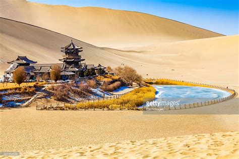 Crescent Moon Lake Yueyaquan Is A Crescent Shaped Lake In An Oasis