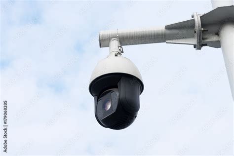 cctv camera in cloud sky Stock Photo | Adobe Stock