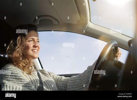 Happy Brunette Driving Car Stock Photo Alamy