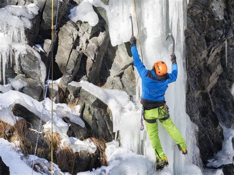 Climber Climbing Ice Wall in Montain Stock Photo - Image of winter ...