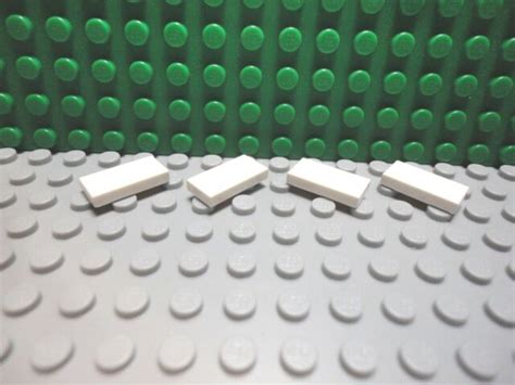 Lego 4 White 1x2 Finishing Tile NEW EBay