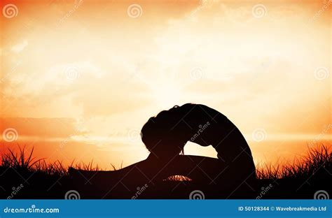 Composite Image Of Gorgeous Fit Blonde In Seated Forward Bend Pose Stock Photo Image Of Grass