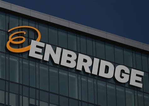 enbridge stock downgraded  investors await financial results