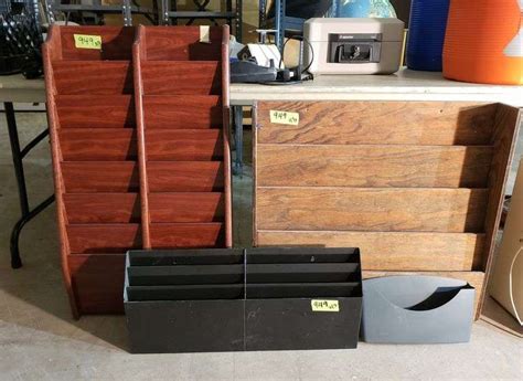 4 Assorted Literature Wall Racks Adam Marshall Land And Auction Llc