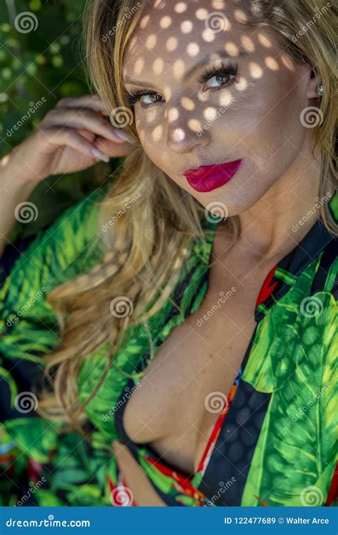 Hot Blonde Brazilian Model Posing Outdoors Against A Field Of Plants Stock Image Image Of
