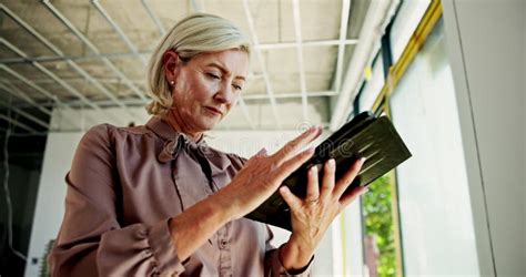 Architect Mature Woman And Tablet For Construction Site Compliance