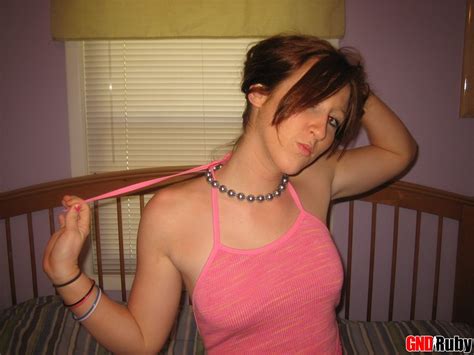 GND Ruby Stripping And Fingering Her Shaved Pussy Photos