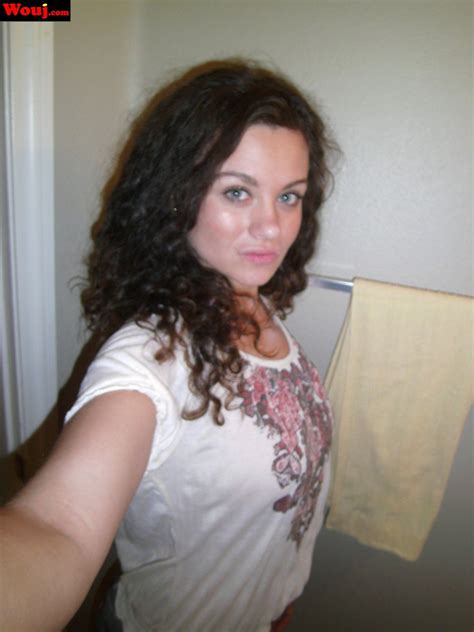 Hot Brunette Chick Taking Pictures Of Her Nice Body Photos