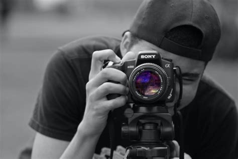 Man Holding Dslr Camera · Free Stock Photo