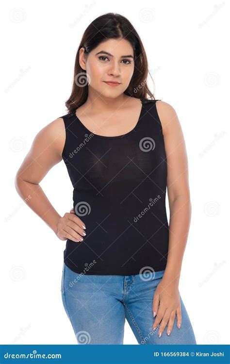 Indian You Girl With Camisole And Jeans Hot Pant With Elegant Pose And Expression Stock Photo