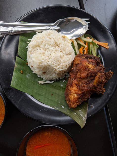 Fried Chicken with Local Rice Called Nasi Dagang Stock Photo - Image of ...