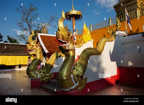 Naga Serpent and chedi pagoda stupa of Wat Phra That Doi Kham or Temple ...
