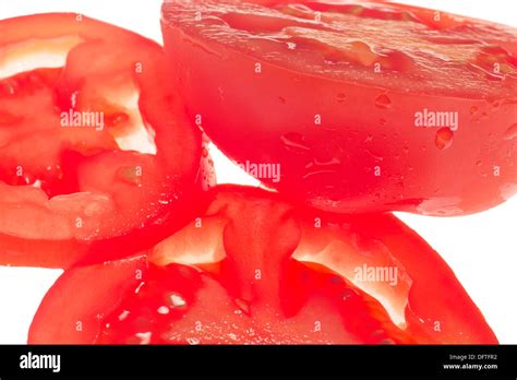 Rodajas de tomate aisladas fotografías e imágenes de alta resolución