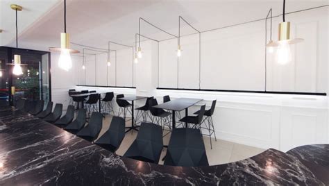 Black And White Restaurant Design Plays On Simplicity
