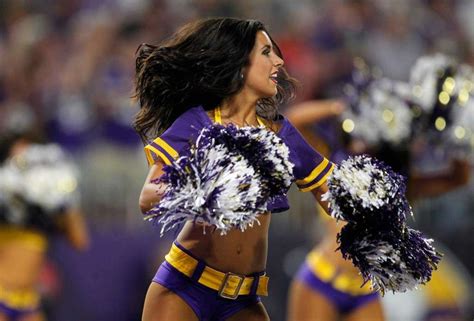 A Minnesota Vikings Cheerleader Performs During The First Half Of An