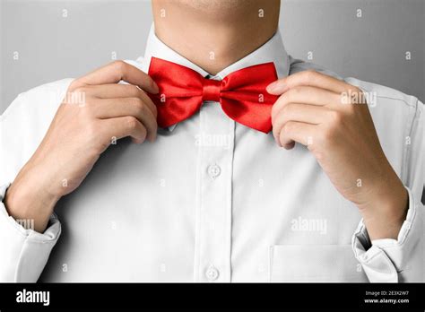 Man Bowtie Adjusting Hi Res Stock Photography And Images Alamy