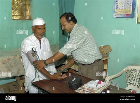 doctor examining villagers  private clinic  ralegan siddhi