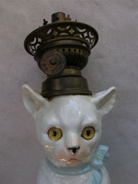cute cat figurine  clock