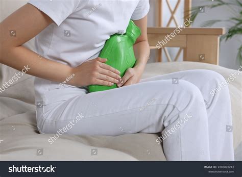 Woman Using Hot Water Bottle Relieve Stock Photo 2203878243 Shutterstock