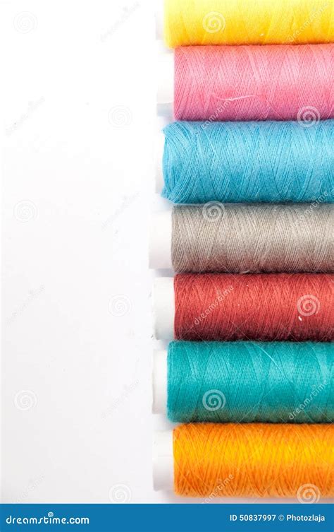 Lined Colorful Thread For Sewing On A White Background Stock Image