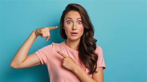 Premium Photo You Want Me Cute Brunette Girl Raising Eyebrows