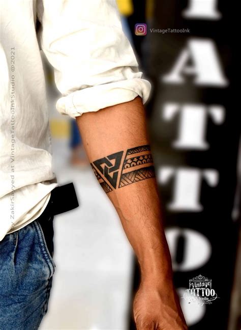 Arm band tattoo | Arm band tattoo, Band tattoo, Forearm band tattoos