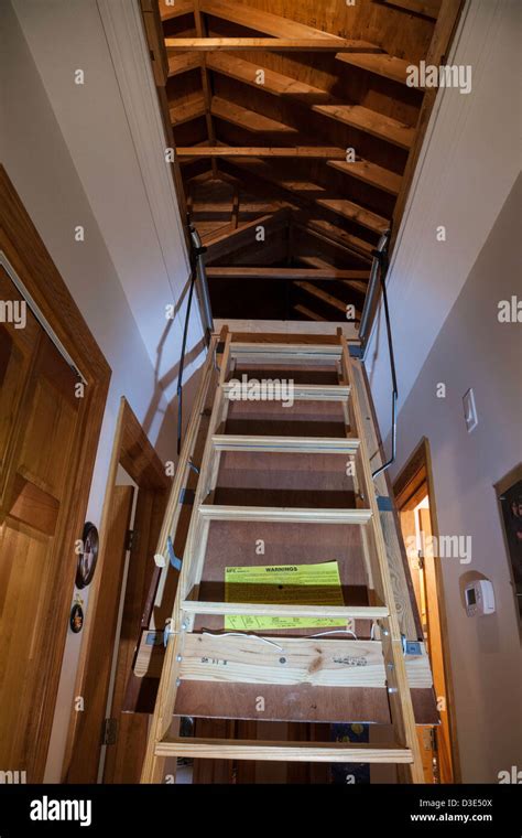 Pull Down Attic Stairs Trap Door In Hallway Of Upscale Residential