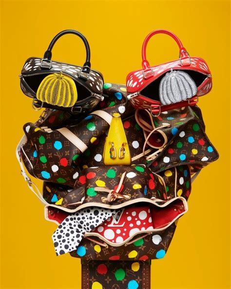 A Pile Of Purses Sitting On Top Of Each Other In Front Of A Yellow