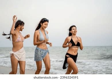 Asian Beautiful Women Friends Bikini Walking Stock Photo 2396324591 Shutterstock