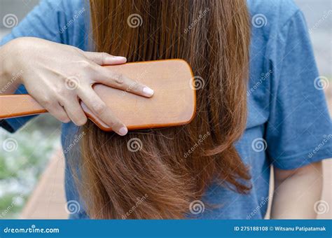 Blonde Haired Asian Woman Posing Front Combing Her Hair Stock Photo Image Of Coiffure Care