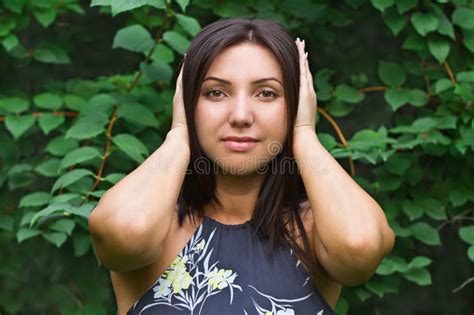 Beautiful Woman Covers Her Hands Over Her Ears Stock Photo Image Of