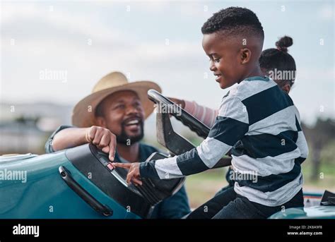 Every Boy Remembers His First Tractor Ride A Mature Man Helping His Adorable Son And Daughter