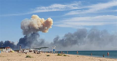 Large explosions rock Russian military air base in Crimea | AP News