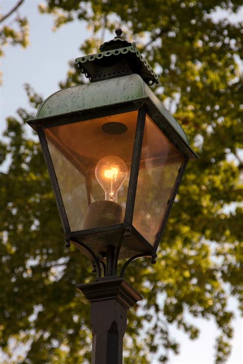 Lighted Street Lamppost Photograph By Sally Weigand Pixels