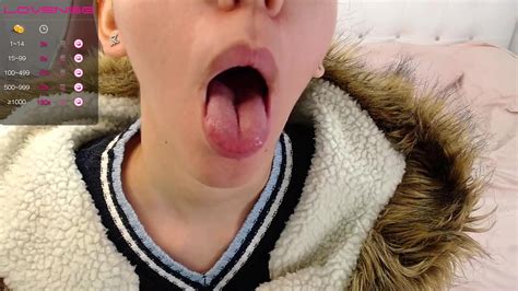 Nerdy Latina Shows Her Tongue ThisVid