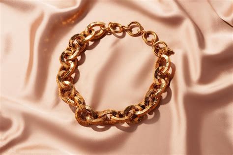 Premium Photo Golden Chain Necklace On Silk Background Close Up