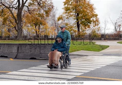 Elderly Gay Man Pushes His Husband Stock Photo 2230005769 Shutterstock