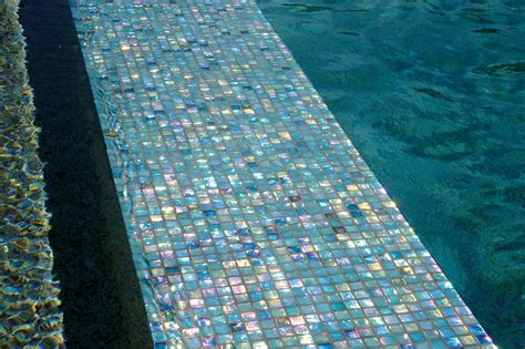 Using Iridescent Glass Tiles On This Pools Interior Creates A Dazzling