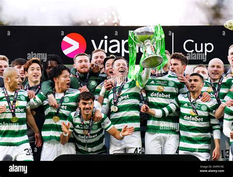 Celtic S Callum McGregor Celebrates With The Viaplay Sports Cup Trophy