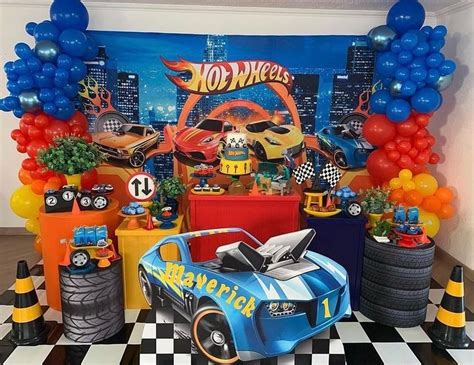 A Birthday Party With Cars And Balloons On The Wall Including A Hot Wheels Theme