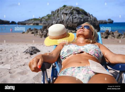 Mature Woman Sunbathing Hi Res Stock Photography And Images Alamy